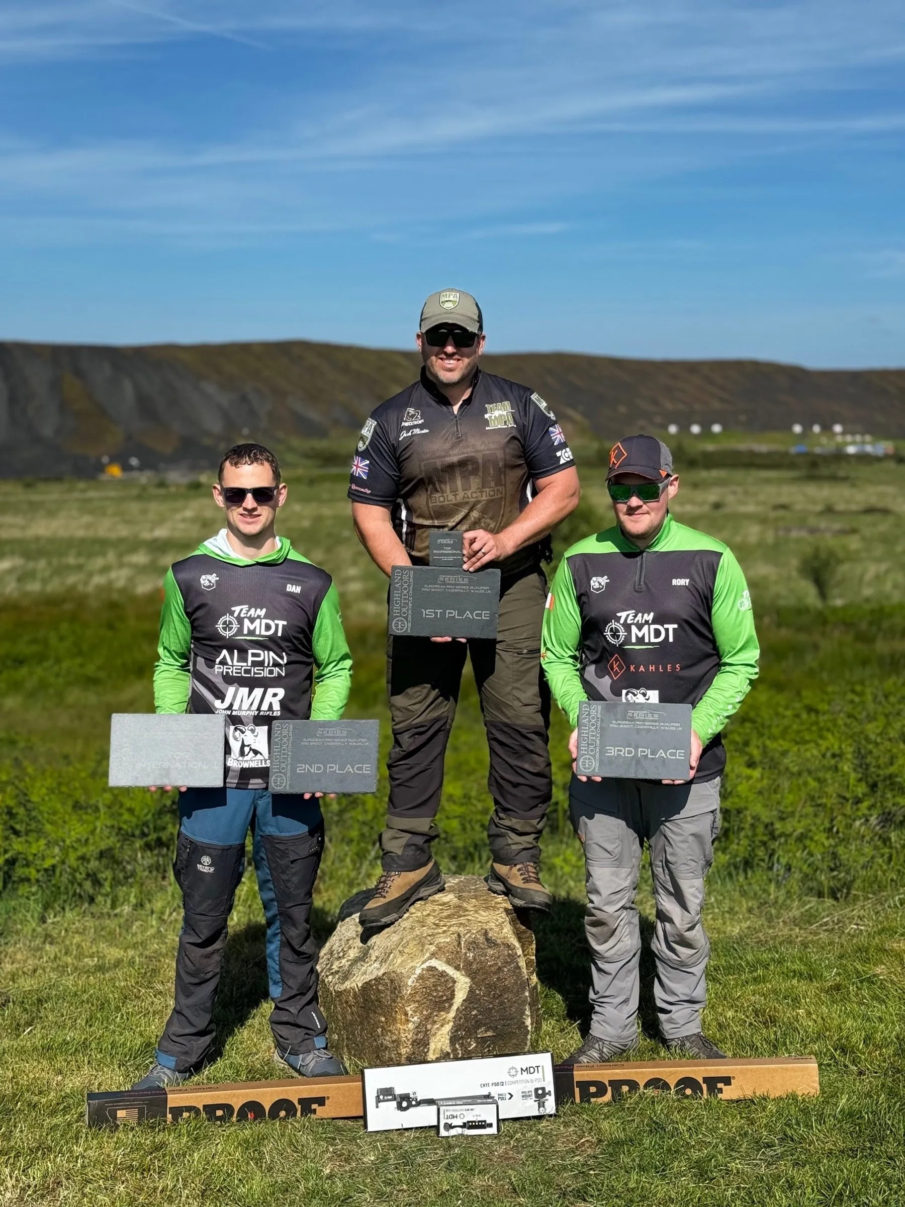 Josh Martin, first place, with team-mates on the podium